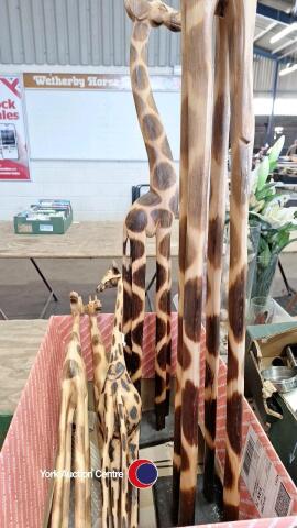 Box of wooden giraffes