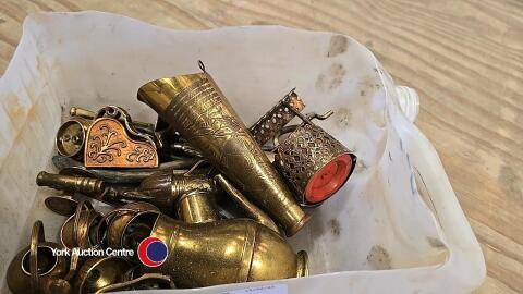 Box of brass ornaments