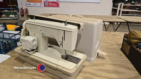 New Home sewing machine in case