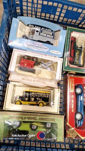 Tray of boxed toy vehicles