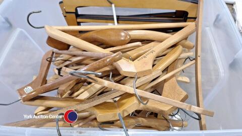 Crate of wooden coat hangers