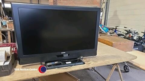 Acoustic solutions 40 inch TV complete with remote