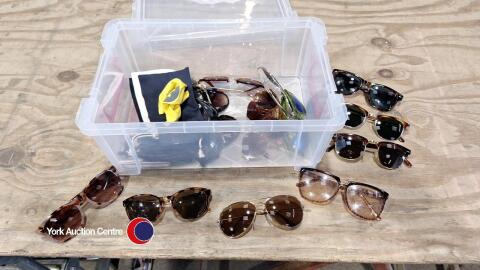 Box of mixed sunglasses and cases