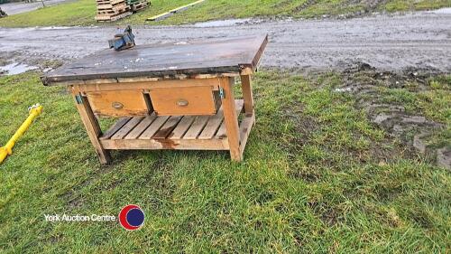 Wooden workbench with vice
