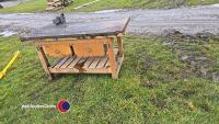 Wooden workbench with vice