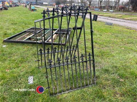 Pair of wrought iron garden gates with Baden Powell motif