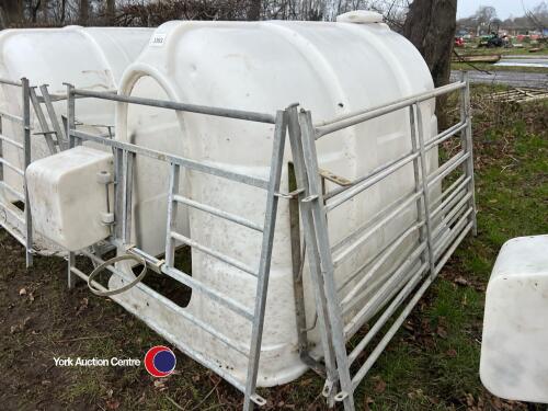 Calf hutch with gates water bucket ring and feed trough