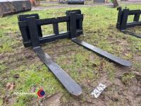 Pair of forks c/w Bobcat brackets.