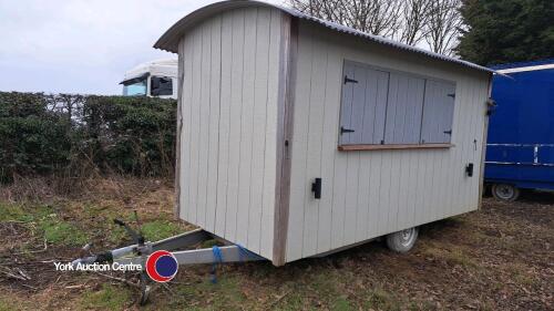 Shepherds Hut 'Bar' 14ft x 7ft on caravan chassis, insulated, inside and outside lighting, stable door, side hatch, work tops, shelves, beer pumps, fridge and sink, suitable for events, painted in Farrow and Ball French Grey, in good condition, key in off