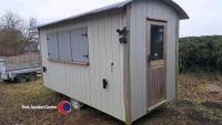 Shepherds Hut 'Bar' 14ft x 7ft on caravan chassis, insulated, inside and outside lighting, stable door, side hatch, work tops, shelves, beer pumps, fridge and sink, suitable for events, painted in Farrow and Ball French Grey, in good condition, key in off - 2