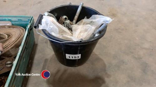 Bucket of new and unused gate hinges and hooks