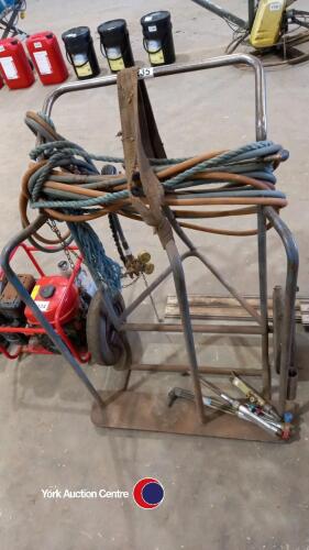 Bottle trolley with baggings, cutting gun and clocks