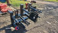 Reel holder for bale wrapper