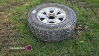 Complete wheel 265/70 R 17 A/T, partly worn - 4