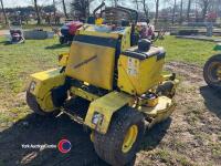 Great Dane stand on grass cutter zero turn