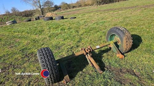 Axle c/w 10/75-15 wheels and tyres