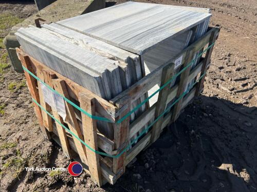 Crate of Carrera marble tiles