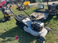 Self propelled petrol lawnmower with grass box
