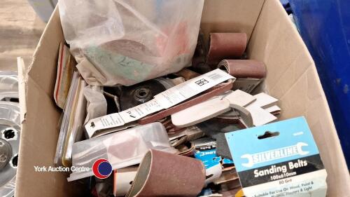Box of assorted sandpaper, sanding discs and sanding belts