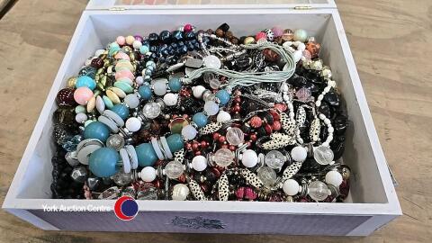 Large hinged decorative box of bead jewellery