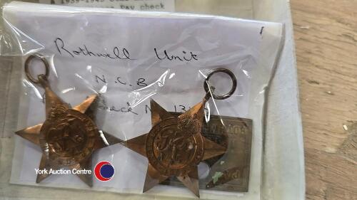 A Burma Star medal and a 1939-1945 Star medal with a Miners Pay check, no 1342. Rothwell Unit NCB