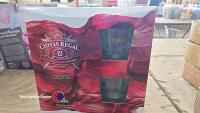 Bottle of Chivas Regal whiskey in display boxes with 2 glasses