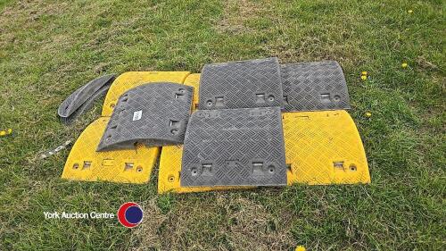 Road speed humps with end caps