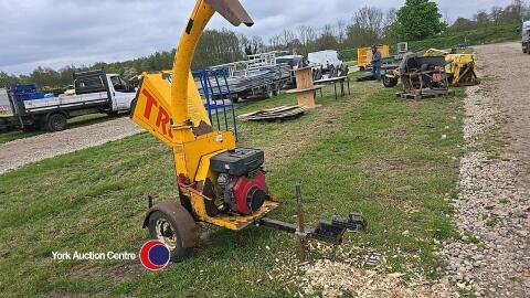 Towable wood chipper, blades in office
