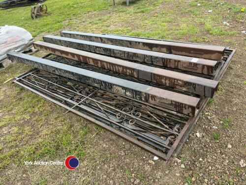 Various ornate metal panels with metal posts