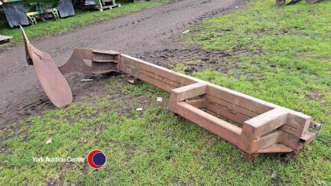 Rabbit fencing ploughing in plough, works on Euro fittings for a front end loader, designed to be held over the fence line and plough the soil back to bury the net