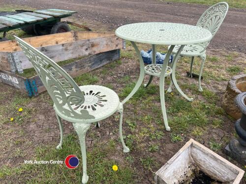 Cast iron table and chairs, gc