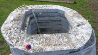 Pallet of new concrete man hole tops - 3