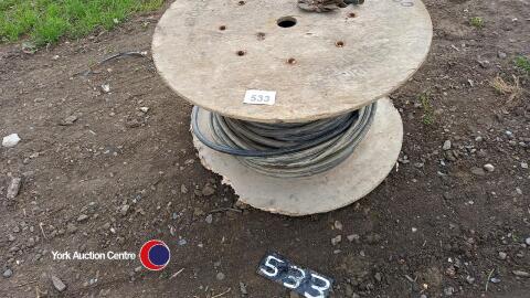Roll of armed cable