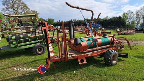 Kverneland bale wrapper, self loading arm