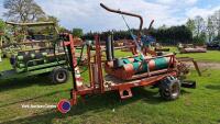 Kverneland bale wrapper, self loading arm