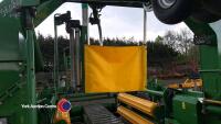 McHale 998 wrapper with round bale and static wrapping kits, controls and manuals in office, 2014 - 7