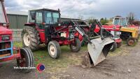 International 484 tractor with loader, power tip for bucket and muck fork, road registered with V5. Serviced with cylinder head and gasket done, starts and runs well, pickup hitch, tipping pipe, power steering. ODN 581T - 2