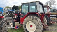 International 484 tractor with loader, power tip for bucket and muck fork, road registered with V5. Serviced with cylinder head and gasket done, starts and runs well, pickup hitch, tipping pipe, power steering. ODN 581T - 5
