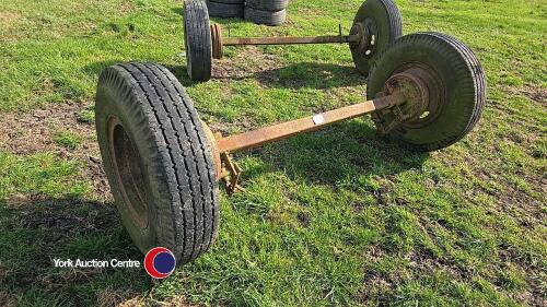 Axles with wheels