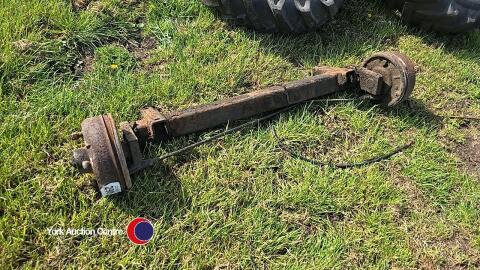 Braked trailer axle