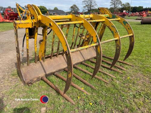 Strimech muck grab, pin and cone brackets