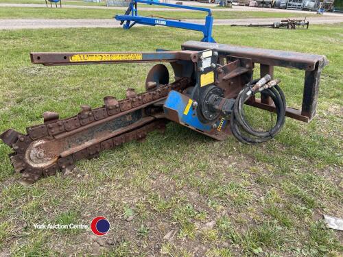Auger torque skidsteer trencher
