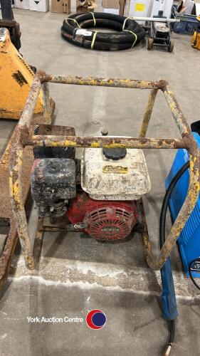 Concrete poker drive unit