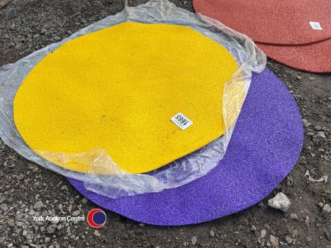 Set of purple and yellow round balance board mats