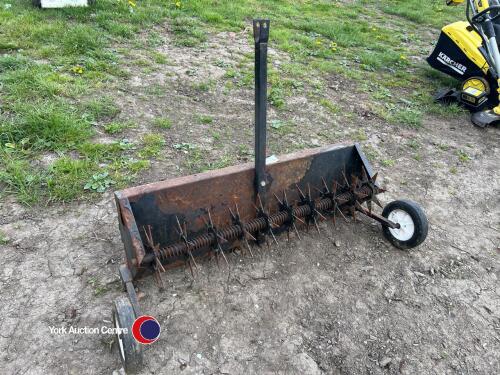 Towable lawn aerator