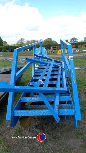 Steel gantry stairs with handrails