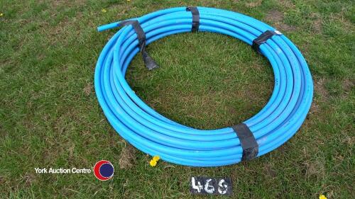 Roll of blue water pipe