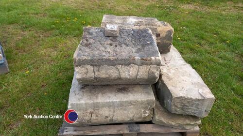 Pallets of reclaimed sandstone