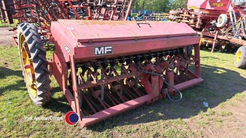 MF 30 corn drill on rowcrop wheels (Drawbar removed for transport inside hopper)