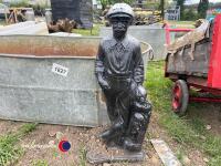 Garden statue of a golfer